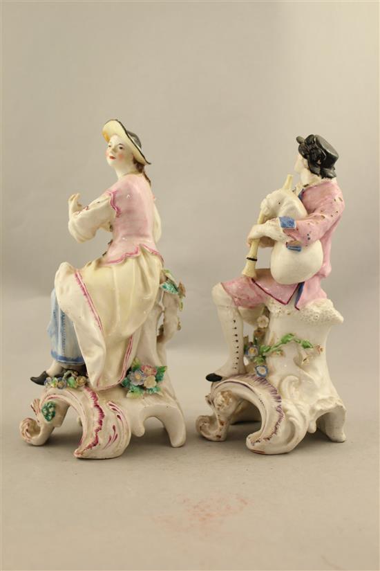 A pair of Chelsea-Derby figures of musicians, c.1775, 21.5cm, restorations